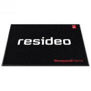Non-skid black carpeted floor mat with Resideo logo